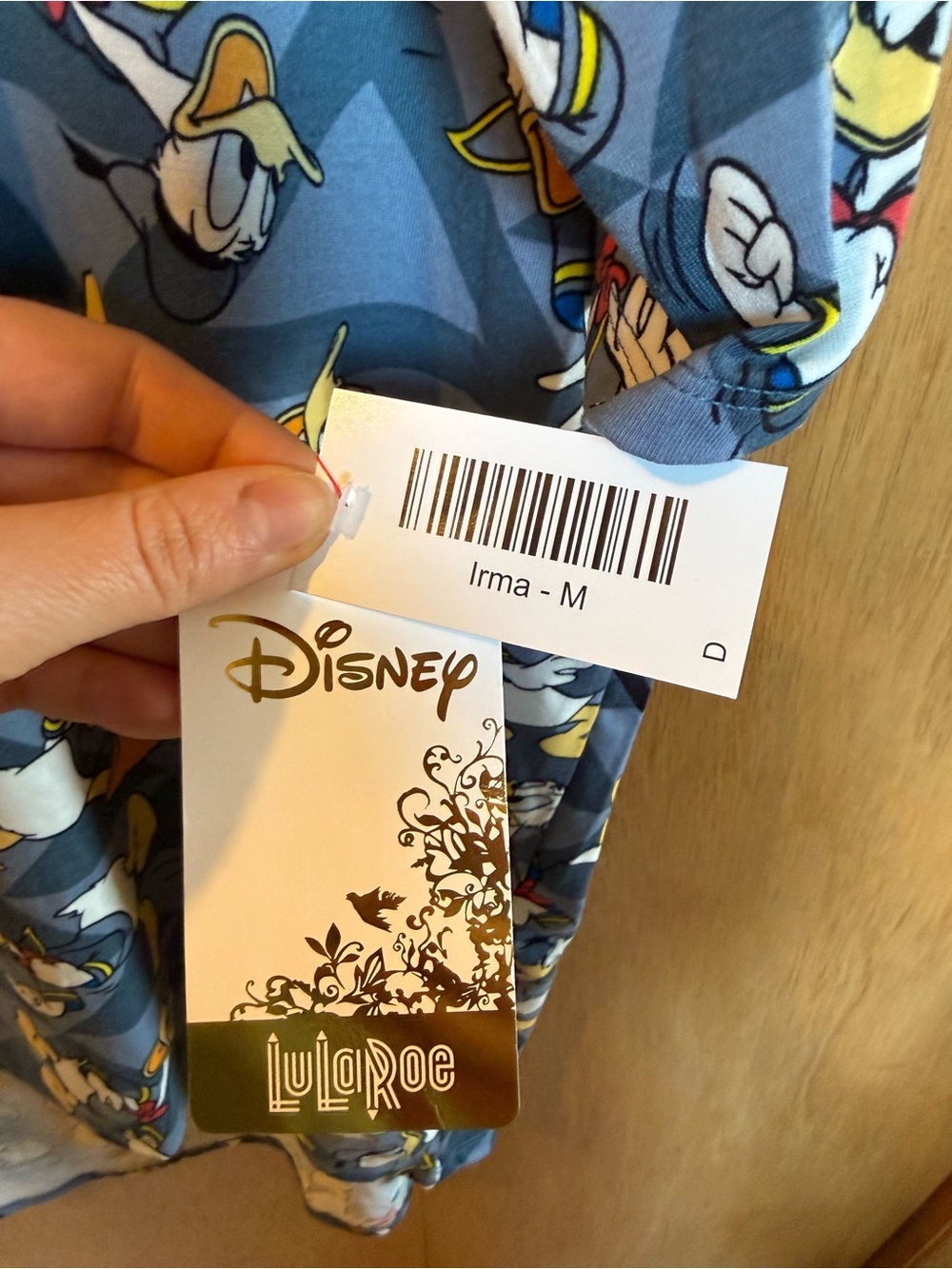 LuLaRoe Women's Disney Donald Duck Irma Tunic Shirt - Blue, Yellow, Orange NWT - Picture 8 of 8
